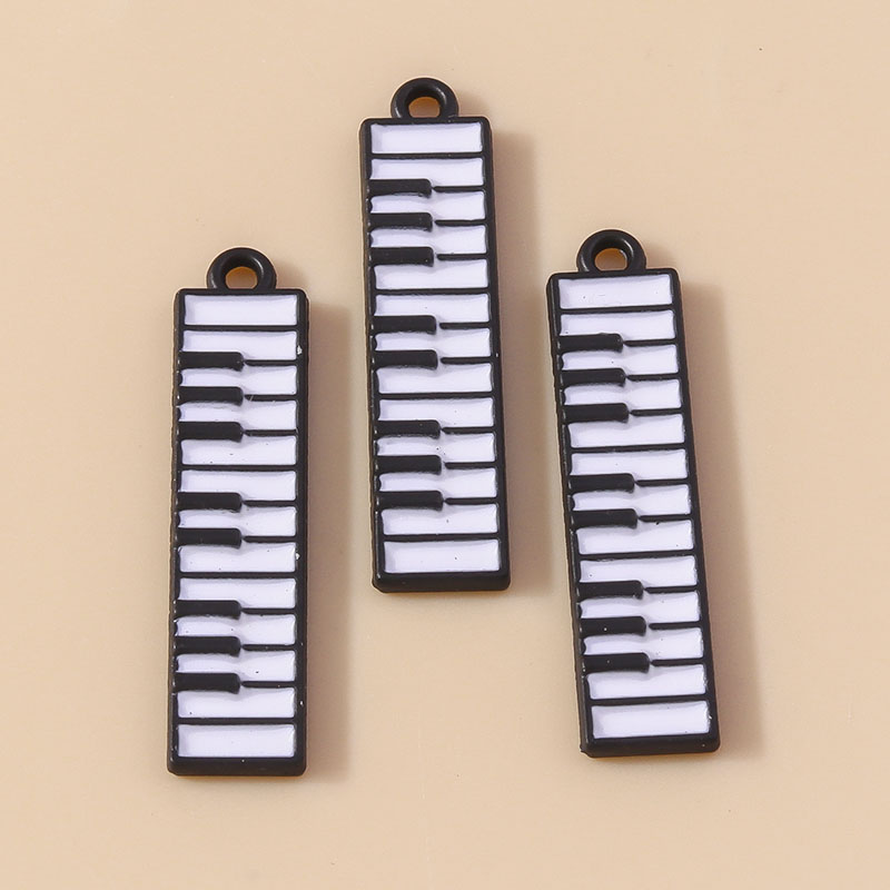 美しいエナメル楽器ピアノチャーム、DIYブレスレットとネック - Musical Instrument Tabla のレビューと価格