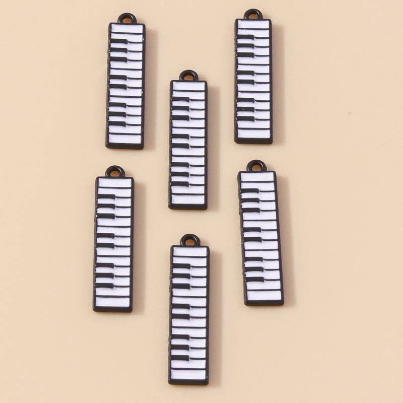 美しいエナメル楽器ピアノチャーム、DIYブレスレットとネック - Musical Instrument Tabla のレビューと価格