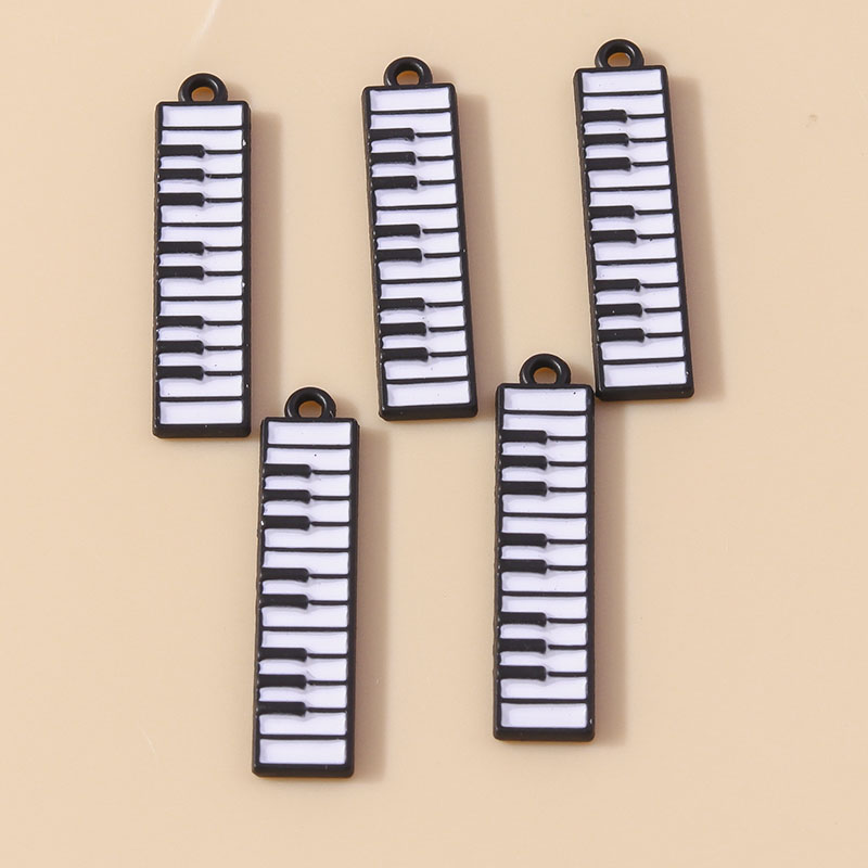 美しいエナメル楽器ピアノチャーム、DIYブレスレットとネック - Musical Instrument Tabla のレビューと価格